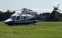 G-BURS - Helicopters arrive at the temporary Heliport on 2007 Epsom Derby Day (Horse racing) - by Terry Fletcher