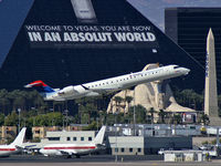 N814SK @ KLAS - Delta Connection - SkyWest / 2006 Bombardier Inc CL600-2D24 - by Brad Campbell