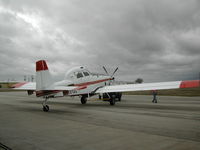 N8512L @ ONY - New Air Tractor being moved back into the factory ahead of approaching storm - by BTBFlyboy