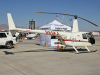 N69KA @ KLSV - Silver State Helicopters LLC - Las Vegas, Nevada / 2002 Robinson Helicopter R44 - by Brad Campbell