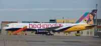 G-MOND @ EGGW - Monarch B757 in Kandi logo - by Terry Fletcher