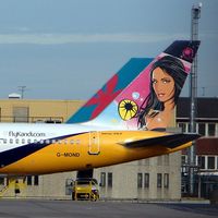 G-MOND @ EGGW - Kandi logo on Monarch B757 - by Terry Fletcher