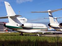 G-HMEV @ EGGW - This falcon seems to have been parked in the same Luton corner for sometime now - by Terry Fletcher