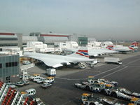 G-BOAC @ EGLL - Two Concordes at the gate at Heathrow back when they could fly - by BTBFlyboy