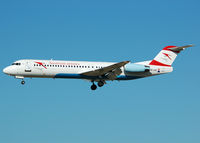 OE-LVC @ LEBL - On final RWY 25 with sticker Unofficial Fan Line in the door... - by Jorge Molina