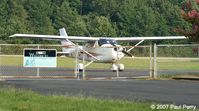 N737LK @ ASJ - Framed up with the welcome sign - by Paul Perry