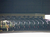 31163 @ RJAK - OH-6D/Kasumigaura (Heads a line of OH-6D's in the hangar)