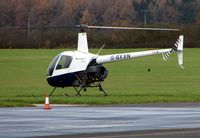 G-BXXN @ EGTB - R22 Beta at Wycombe Air Park - Booker Airfield - by Terry Fletcher