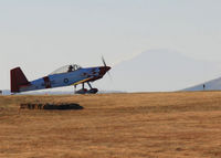 N134DC @ KAPA - Taxi out for takeoff on 17-L for a day of fun. Pikes Peak in the background.