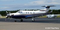 N455DK @ SFQ - Closer to the Pilatus.  Pretty girl