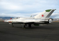 N221UM @ 4SD - 1983 Mikoyan Gurevich MIG 21 UM #9293 as NX221UM @ Reno-Stead - by Steve Nation