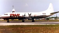 N590HG @ OPF - This DHL Electra had just acquired its America marks  in 2001 - by Terry Fletcher