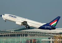 HA-LOM @ LEBL - Taking off RWY 25L. - by Jorge Molina