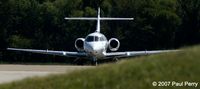 N180EG @ ORF - Partially obscured by the berm - by Paul Perry