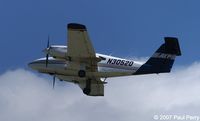 N3052D @ ORF - Nosewheel in and closing, now for the mains