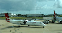 VH-QOB @ YBBN - De Havilland Canada DHC-8-402Q Dash 8 arriving into Brisbane
