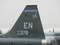66-4378 @ AFW - On the ramp at Alliance Ft. Worth - Tail shot only because of parking formation