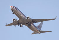 N964AN @ KSNA - American Arlines Boeing 737-823 blasting off - by Mike Khansa