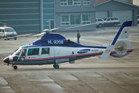 HL9208 @ RKPK - Taxiing to the parking position - by Micha Lueck