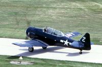 N9789Z @ DPA - Harvard Mk.2 AJ731, ex-AT-6C, Taxiing by the control tower - by Glenn E. Chatfield