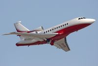 VH-PPD @ OMDB - FALCON 900