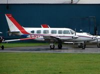 G-PZAZ @ EGTK - Piper Navajo at a very wet Oxford Kidlington - by Terry Fletcher