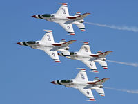 87-0319 @ KLSV - USA - Air Force / 1987 General Dynamics F-16C Fighting Falcon (Block 32J) - Thunderbird #1 - Lt. Colonel Kevin Robbins (Commander/Leader) leads the Diamond Formation. - by Brad Campbell