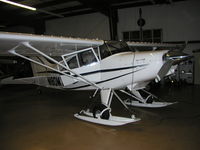 N180MX @ KLVN - Parked in the hangar with new skis. - by Mitch Sando