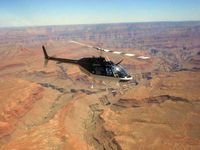 N8533F - Papillon Helicopters Copter 3 with its new paint over the Grand Canyon. - by Tom Norvelle