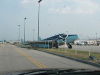 N234P @ KNEW - Hurricane Katrina aftermath - by Tom Norvelle