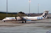 G-JEDW @ EGBB - Dash 8 on stand as dawn breaks on a wintery morning at Birmingham International (UK) - by Terry Fletcher