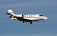 N580QS @ KSJC - On final RWY 12R - by Fariborz