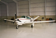 N555GG @ GNV - 1967 Beech V35 taken in hanger - by Dale Sheeley