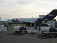 N209FE @ OAK - This is a RESTRICTED AREA. - by Andy Renteria