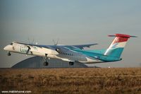 LX-LGC @ ELLX - DHC-8 wearing the nice new colors from Luxair Taking off from runway 06 - by Michel Teiten ( www.mablehome.com )