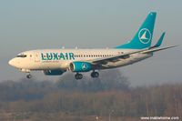 LX-LGQ @ ELLX - Luxair flight about to touch down on runway 26 - by Michel Teiten ( www.mablehome.com )