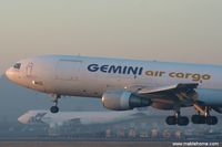 N607GC @ ELLX - Gemini Air Cargo landing on runway 26 just before dawn - by Michel Teiten ( www.mablehome.com )