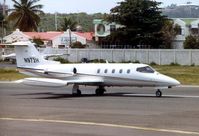 N972H @ TNCM - N972H was a Learjet 25 c/n 370 seen here at St.Maarten in 1993 . Subsequently became N888DV - by Terry Fletcher