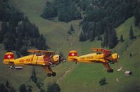 HB-MKP - BÃ¼cker 133 Jungmeister Formation - by Erich Gandet