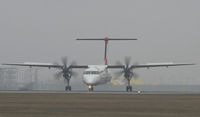 OE-LGE @ LOWW - AUSTRIAN ARROWS Dash 8 line up rwy 16 - by Delta Kilo