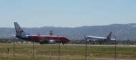 VH-VBV @ YPAD - Taxiing F5, For Rwy 05. Nice with the Jetstar A320-200 in the background! Too bad about the fence though =( - by James Mitchell