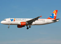 EI-DNP @ LEBL - On final to RWY 25R. - by Jorge Molina