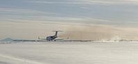 N689JE @ KAPA - Take-off and kicking up the snow - by John Little