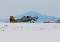 N878RV @ KAPA - Taxi to takeoff. Pikes peak in the background. - by Bluedharma