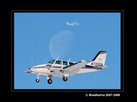 N7215R @ KAPA - Composite picture of moon and final approach to 17L. - by Bluedharma