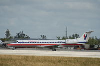N802AE @ KMIA - EMB-135KL - by Mark Pasqualino