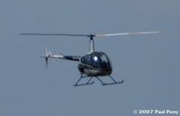 N442FA @ SFQ - An R22 coming in, amidst the other helo traffic