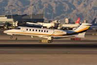 N300JC @ LAS - CECO's brand new 2007 Bombardier Learjet 45 N300JC from Reno/Tahoe Int'l (KRNO) landing on RWY 25L in nice evening light.  The company's former plane was a 2002 Lear 45 (N300JC, c/n 45-209). - by Dean Heald