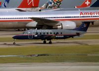 N100UX @ ORD - Beech 1900D dwarfed by all the TransAtlantic Carriers at Chicago O'Hare - by Terry Fletcher