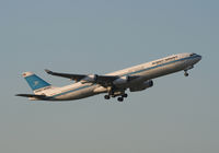 9K-ANA @ CDG - flying shoot - by Alain Picollet